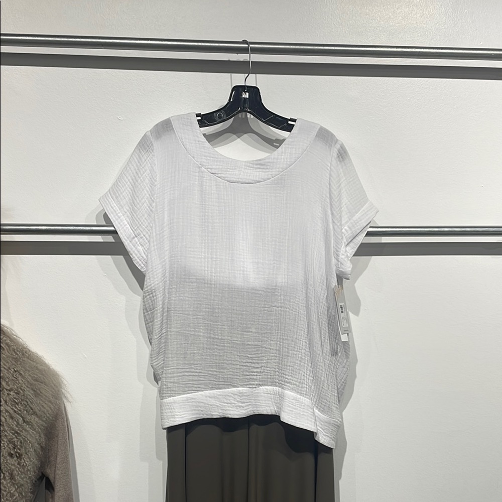 Sympli white cotton gauze back button top.